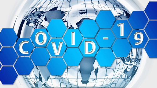 A graphic formed of a wireframe globe with blue hexagons across the centre and the letters Covid-19 spelled out across some of those