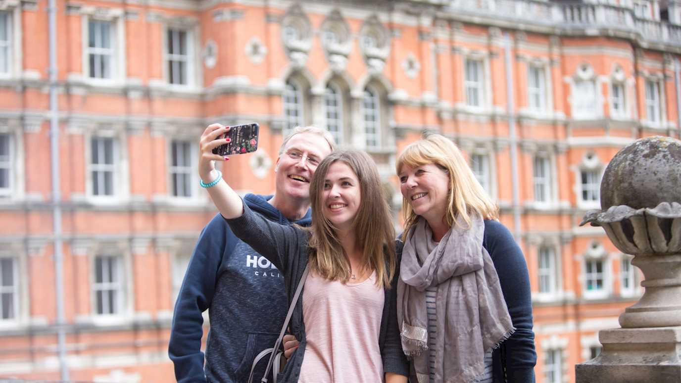 Parents and child at university